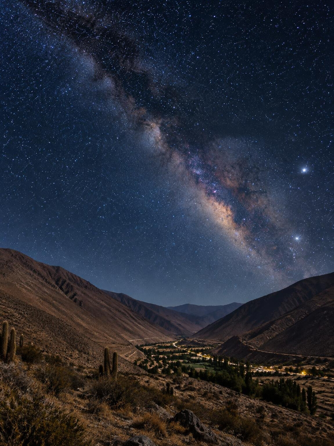 Clear starry night sky over hills
