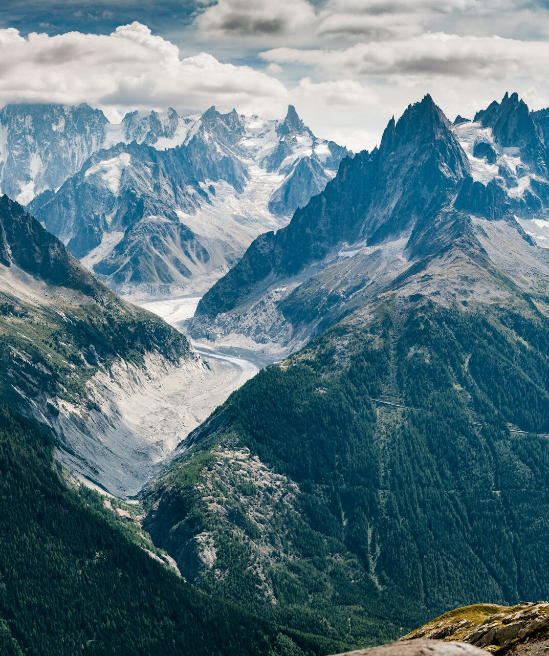 Snow-capped mountains above a valley